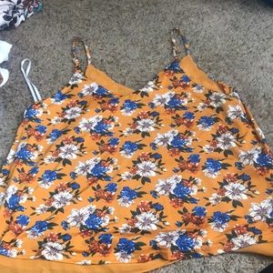 Mustard Yellow tank top with flowers.